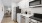 a kitchen with white cabinets